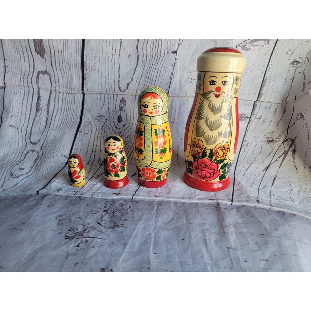 Vintage Santa Claus Russian Nesting Dolls With Floral Design Made in USSR Read